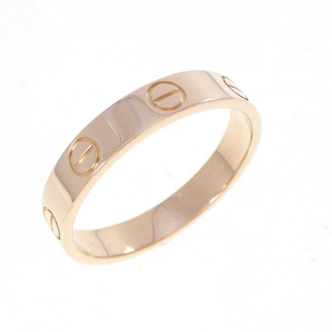 Cartier Mini Love Ring: --- Catalog ---Category: SizeUS Size: 7Brand Size: 54Category: DesignType: Band ringColor: Pink goldGender: WomenMaterial: Pink gold (18K)Category: GeneralBrand: Cartier--- Item List ---Section: Condi