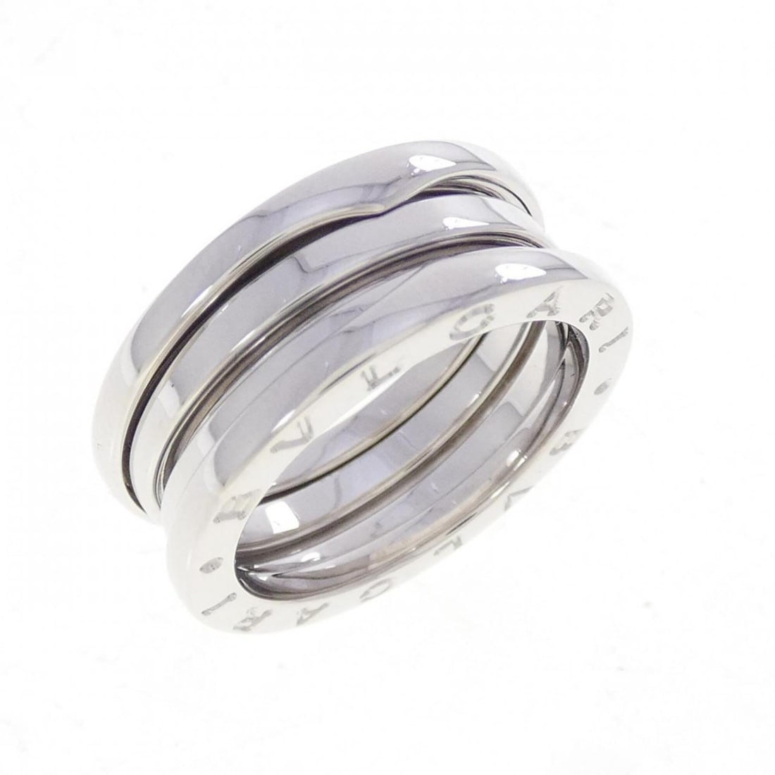 Bvlgari B.zero1 3-band ring: --- Catalog ---Category: SizeUS Size: 7Brand Size: 54Category: DesignType: Band ringColor: White goldGender: WomenMaterial: White gold (18K)Category: GeneralBrand: Bvlgari--- Item List ---Section: Con