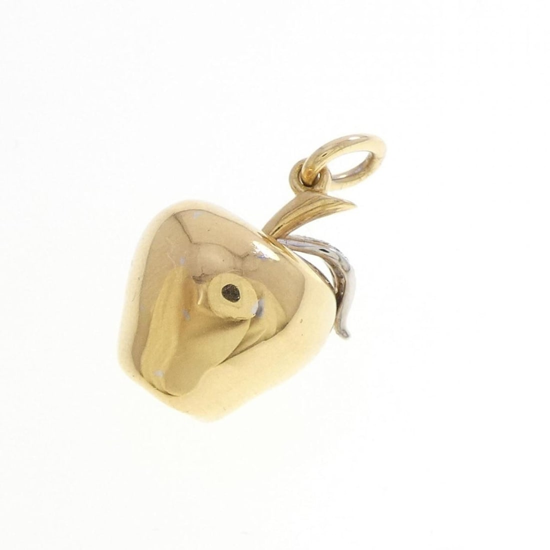 Tiffany Apple Pendant: --- Catalog ---Category: SizePendant Size: 23.5mm x 14.7mm / 0.92'' x 0.57''Category: DesignColor: White gold, Yellow goldGender: WomenMaterial: White gold (18K), Yellow gold (18K)Pendant Type: Pendan