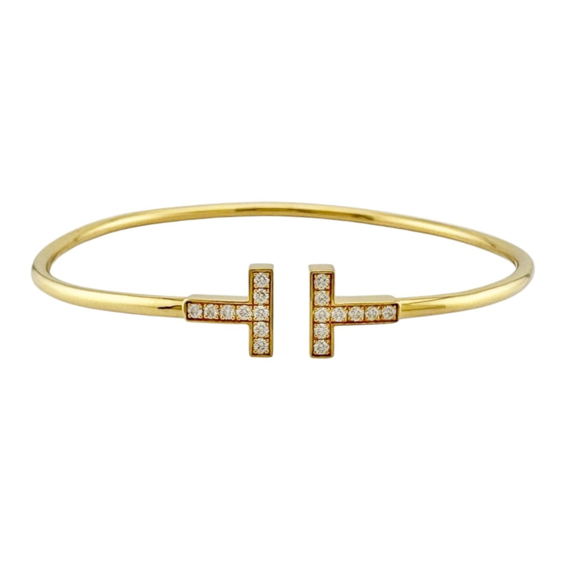 Tiffany & Co. T Wire Bangle, 18K Yellow Gold, Diamond, Women's.: --- Catalog ---Category: PackNumber in Pack: 1Category: SizeLength: 17cm / 6.69''Category: DesignType: BangleColor: Yellow goldStone: DiamondGender: WomenMaterial: Yellow gold (18K)Category: GeneralBr