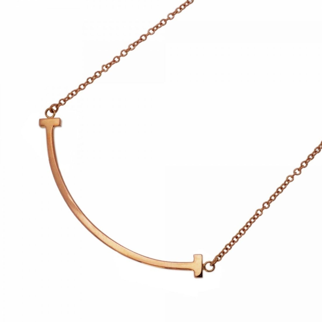 Tiffany & Co. T Smile Small Necklace, 18K Pink Gold, Women's: --- Catalog ---Category: SizePendant Size: 10.1mm x 37.8mm / 0.39'' x 1.48''Neck Circumference: 39.5 cm - 44.5 cm / 15.55'' - 17.51''Category: DesignGender: WomenMaterial: Pink gold (18K)Necklace Type