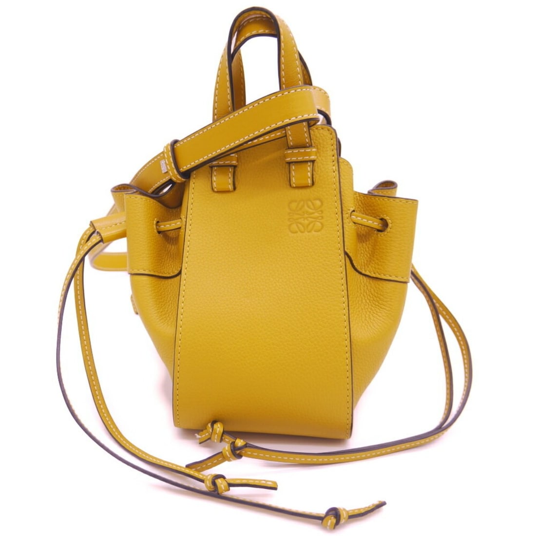 LOEWE Hammock Drawstring Bag Mini 314.12.V07: --- Catalog ---Category: SizeSize (HxWxD): 19.5cm x 10.5cm x 16.5cm / 7.67'' x 4.13'' x 6.49''Category: DesignType: Shoulder bagColor: YellowGender: WomenCategory: GeneralMPN: 314.12.V07Brand: Loewe--