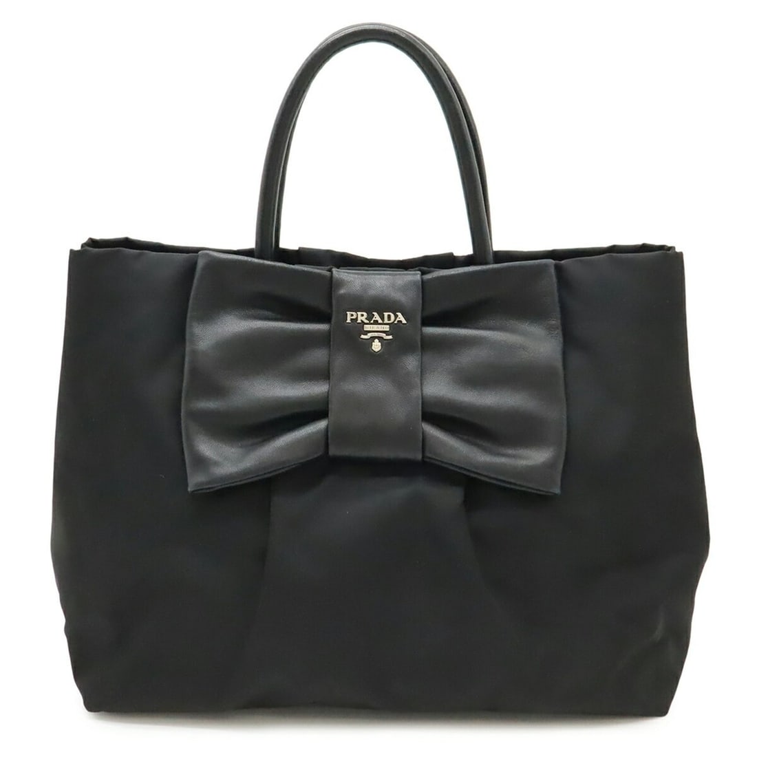 PRADA Prada Tote Bag Handbag Ribbon Nylon Leather NERO Black BN1601: --- Catalog ---Category: SizeSize (HxWxD): 23cm x 27.5cm x 17cm / 9.05'' x 10.82'' x 6.69''Category: DesignType: Handbag, Tote bagColor: Black, NeroGender: Men,WomenMaterial: Nylon , Leather Category: