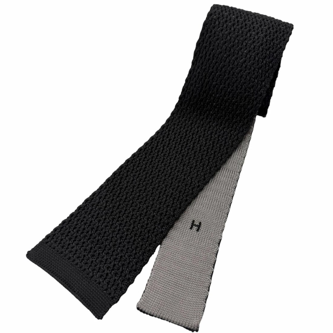 HERMES 100% Silk Embroidered Knit Tie with H Logo, Charcoal Gray/Light Gray, Made in Italy, Men's: --- Catalog ---Category: SizeWidth: 6cm / 2.36''Total Length: 146cm / 57.48''Category: DesignType: CravatColor: Light grayGender: MenMaterial: Silk Category: GeneralBrand: HermesCountry of Origin: Ita
