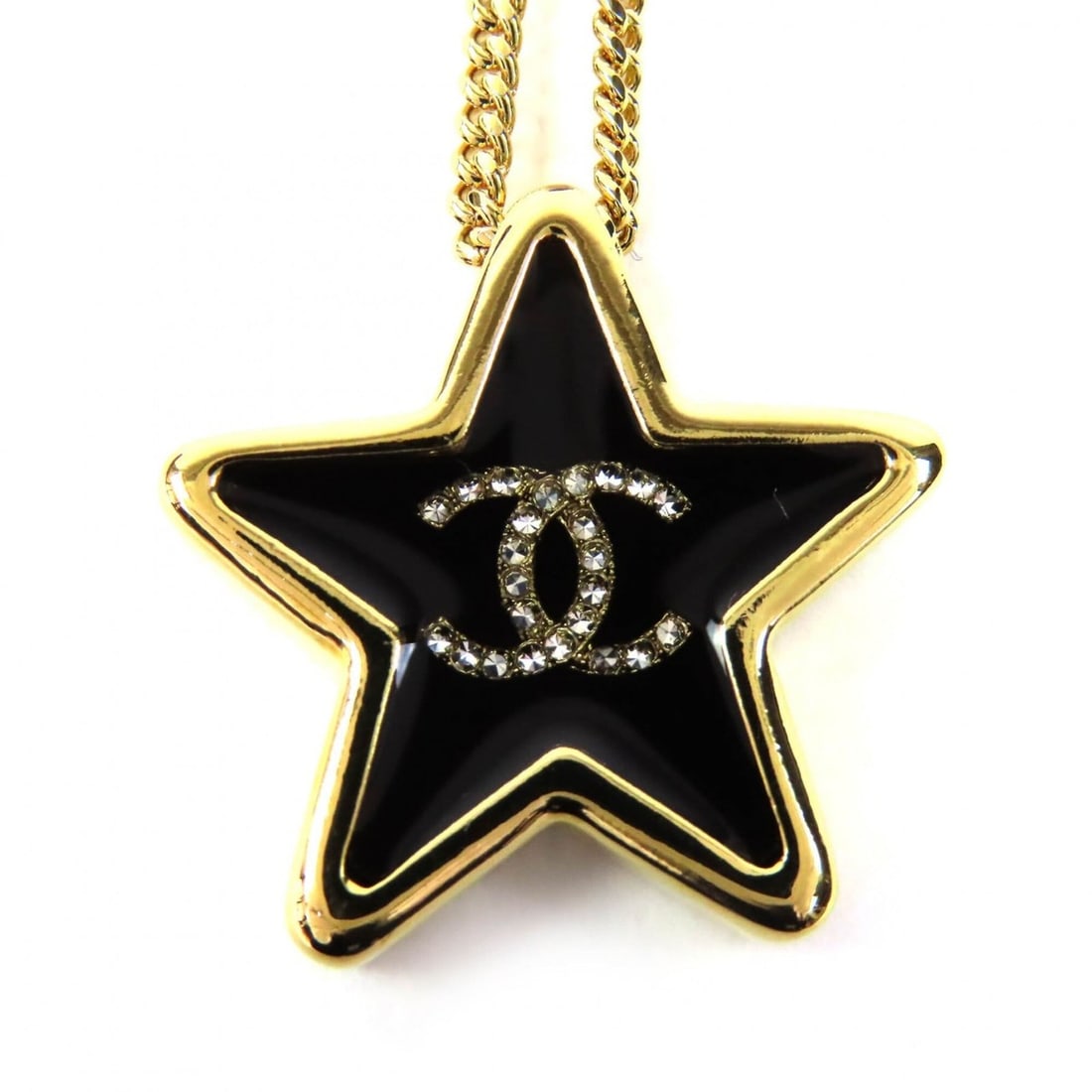 CHANEL ABG573 D25K Crystal Coco Mark Star Necklace Pendant, Gold and Black, with Box, Made in: --- Catalog ---Category: SizePendant Size: 24mm x 24mm / 0.94'' x 0.94''Neck Circumference: 40 cm - 46 cm / 15.74'' - 18.11''Category: DesignColor: Black, GoldGender: WomenPendant Type: