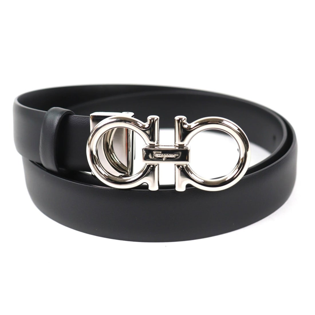 Salvatore Ferragamo CS-23B559 Gancini Buckle Leather Belt, Black with Silver Hardware, Made in: --- Catalog ---Category: SizeLength: 79.5cm - 89.5cm / 31.29'' - 35.23''Category: DesignType: Standard beltColor: BlackGender: WomenMaterial (Strap): Leather Category: GeneralBrand: Salvatore Ferragam