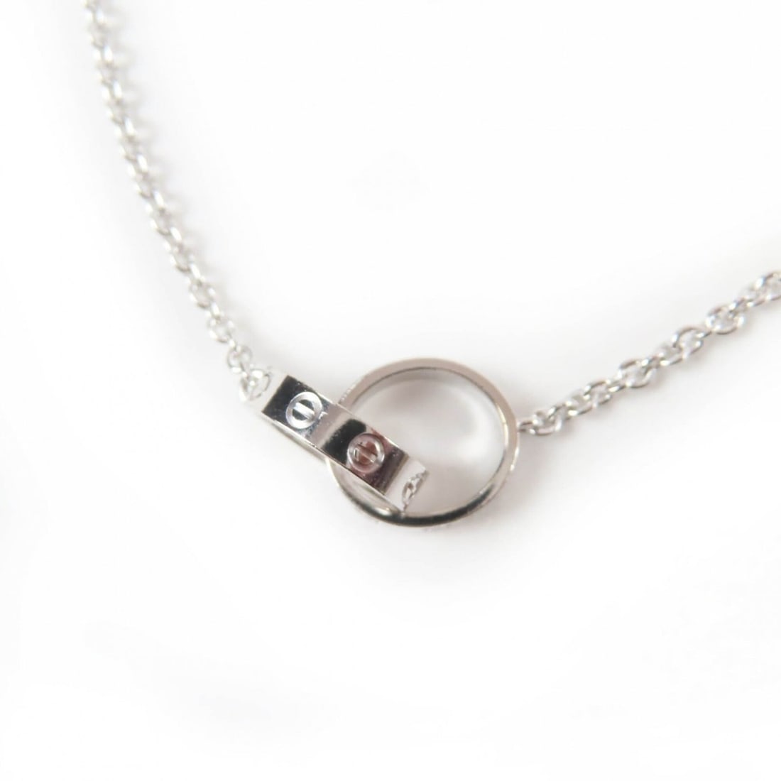 Cartier DP0253 B7212500 Love Necklace 750 (WG) Baby White Gold with Storage Bag Weight 8.08g Women's: --- Catalog ---Category: SizeWeight: 8.08g / 0.28oz.Pendant Size: 10mm x 18mm / 0.39'' x 0.7''Neck Circumference: 43 cm / 16.92''Category: DesignColor: White goldGender: WomenMaterial: White gold (18K