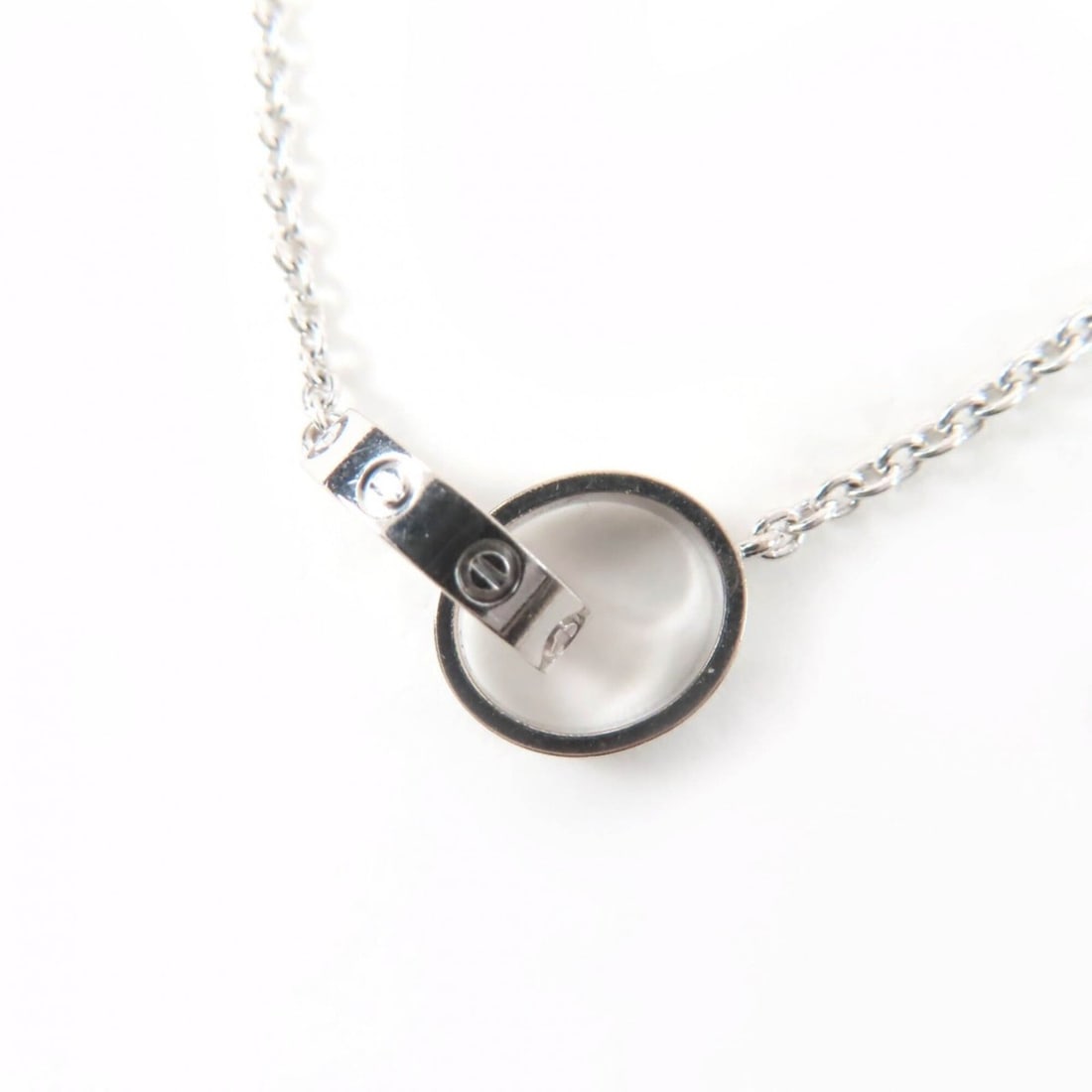 Cartier SR1492 Baby Love Necklace 750 (WG) Pendant White Gold Weight 7.14g Women's: --- Catalog ---Category: SizeWeight: 7.14g / 0.25oz.Pendant Size: 10mm x 17mm / 0.39'' x 0.66''Neck Circumference: 44 cm / 17.32''Category: DesignColor: White goldGender: WomenMaterial: White gold (18