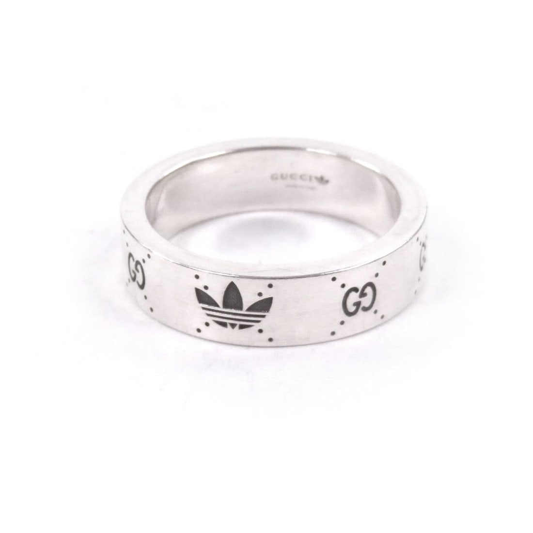 GUCCI adidas 702764 AG925 GG Logo Trefoil Ring, Silver, Size 22, Made in Italy, Weight 9.0g, Men's: --- Catalog ---Category: SizeWidth: 5mm / 0.2''Weight: 9g / 0.31oz.JP Size: 21US Size: 10Category: DesignType: Band ringColor: SilverGender: MenMaterial: Silver 925Category: GeneralBrand: GucciCountry