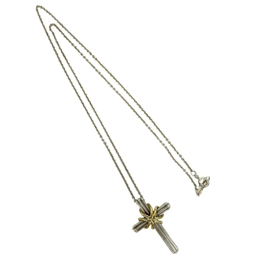 TIFFANY&Co. Tiffany Signature Cross Sterling Silver 925 18K Yellow Gold Necklace Pendant 28589: --- Catalog ---Category: SizePendant Size: 33mm x 22mm / 1.29'' x 0.86''Neck Circumference: 46 cm / 18.11''Category: DesignColor: Gold, SilverGender: WomenMaterial: Silver 925, Yellow gold (18K)Pendan