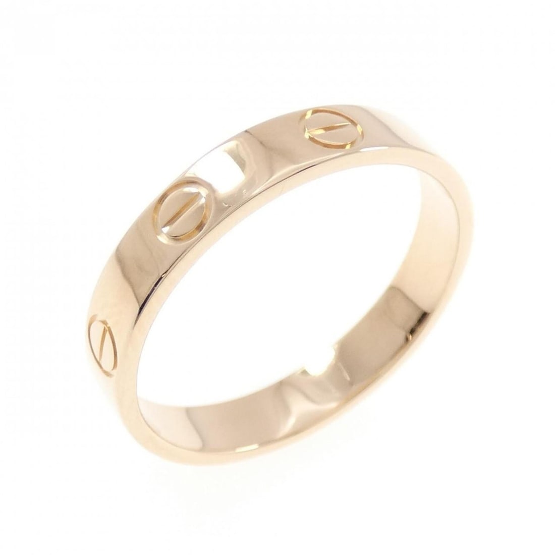 Cartier Mini Love Ring: --- Catalog ---Category: SizeUS Size: 7.5Brand Size: 55Category: DesignType: Band ringGender: Women,MenMaterial: Pink gold (18K)Category: GeneralBrand: Cartier--- Item List ---Section: ConditionRankin