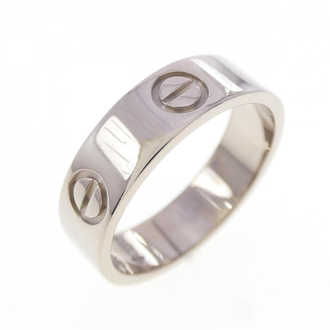 Cartier Love Song Ring: --- Catalog ---Category: SizeJP Size: 14.5US Size: 7Category: DesignColor: White goldGender: WomenMaterial: White gold (18K)Category: GeneralBrand: Cartier--- Item List ---Section: ConditionRanking: