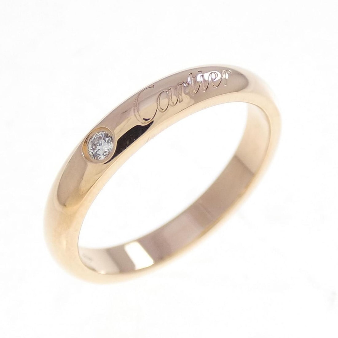 Cartier wedding ring: --- Catalog ---Category: SizeUS Size: 4.5Brand Size: 48Category: DesignType: Band ringGender: WomenMaterial: Pink gold (18K)Category: GeneralBrand: Cartier--- Item List ---Section: ConditionRanking: