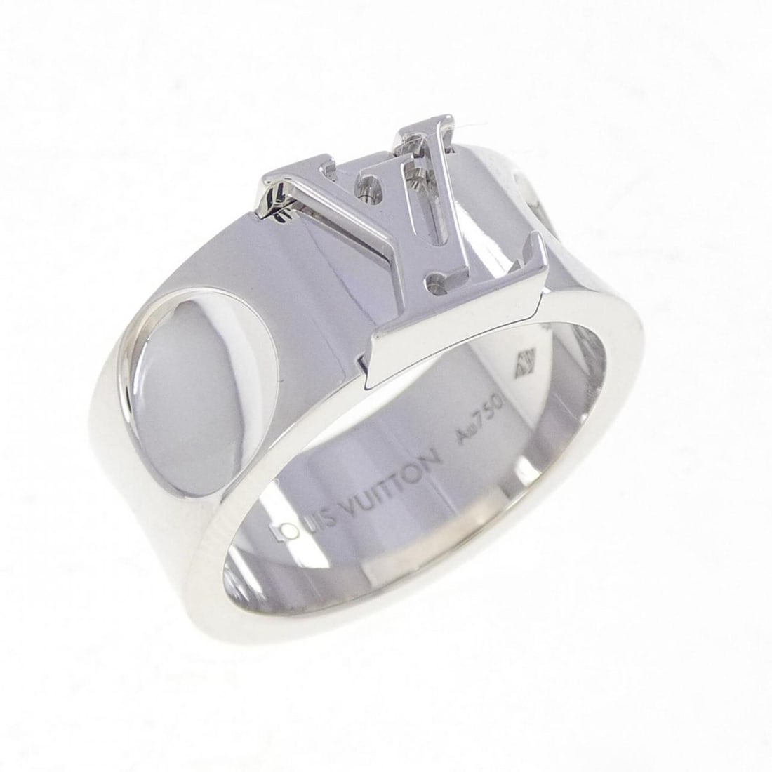 Louis Vuitton Large Empreinte Ring: --- Catalog ---Category: SizeUS Size: 6.5Brand Size: 52Category: DesignType: Band ringGender: WomenMaterial: White gold (18K)Category: GeneralBrand: Louis Vuitton--- Item List ---Section: