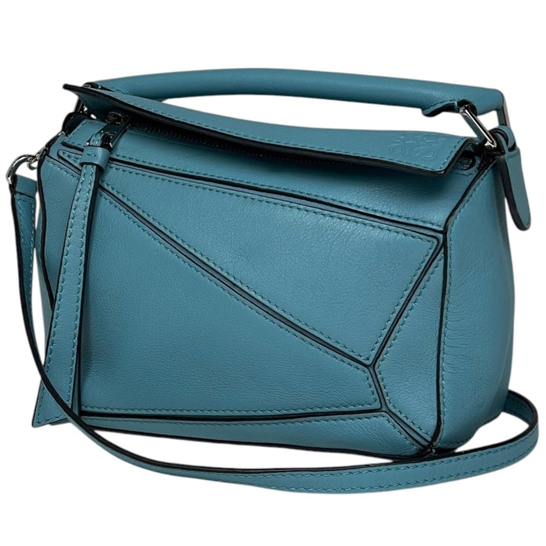 Loewe Puzzle Bag Mini Anagram 2-Way Handbag Leather Blue Women's: --- Catalog ---Category: SizeSize (HxWxD): 12cm x 17cm x 7.5cm / 4.72'' x 6.69'' x 2.95''Category: DesignType: HandbagColor: BlueGender: WomenMaterial: Leather Category: GeneralBrand: Loewe--- Item Li