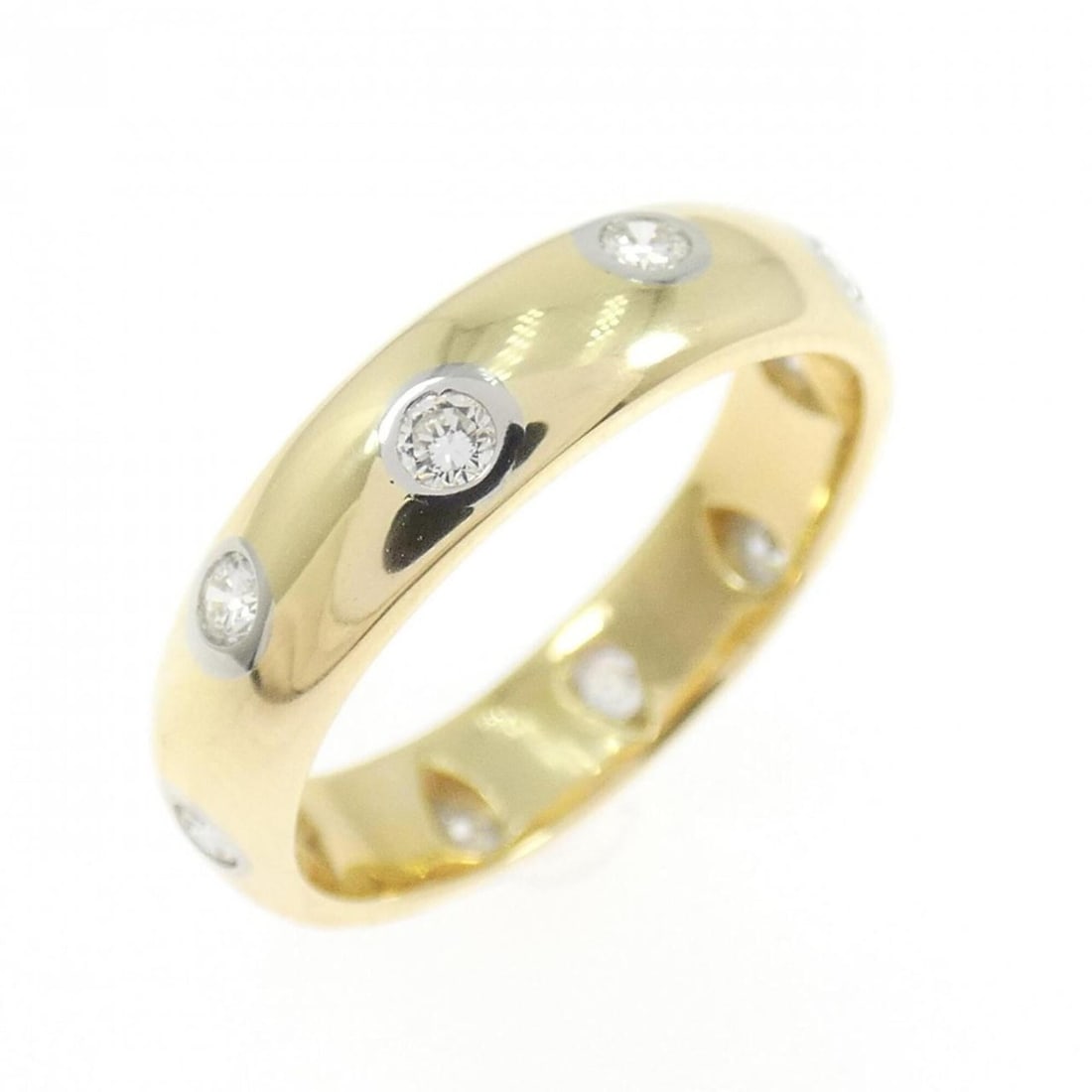 Tiffany Dots Ring: --- Catalog ---Category: SizeWidth: 4.1mm / 0.16''Weight: 3.7g / 0.13oz.JP Size: 6.5US Size: 3.5Category: DesignType: Band ringStone: DiamondGender: WomenMaterial: Platinum 950, Yellow gold (18K)Categ