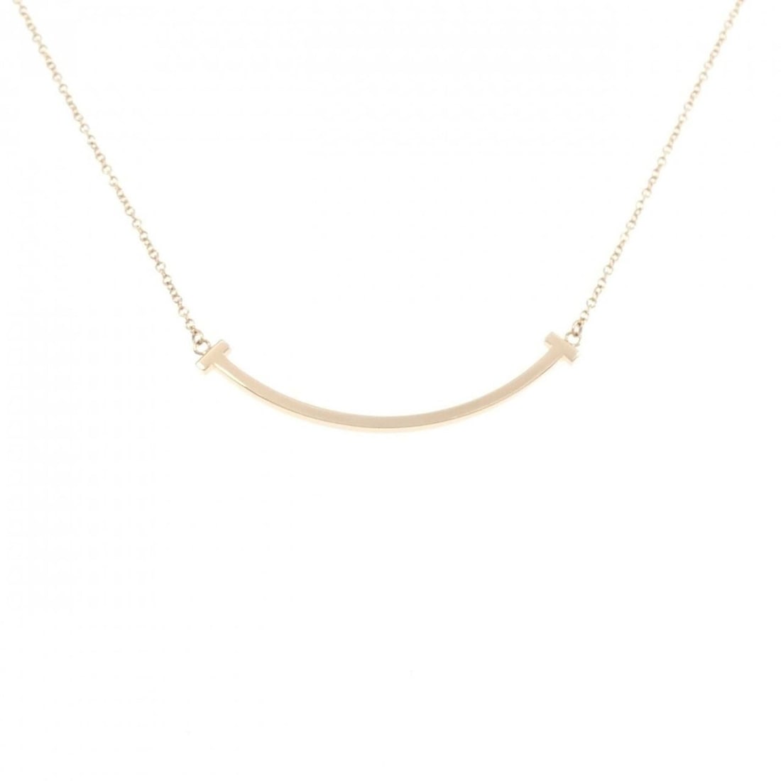 Tiffany T Smile Small Necklace: --- Catalog ---Category: SizeWidth: 1.1mm / 0.04''Weight: 2.8g / 0.09oz.Pendant Size: 3.6mm x 37mm / 0.14'' x 1.45''Neck Circumference: 40 cm - 46 cm / 15.74'' - 18.11''Category: DesignGender: WomenMa