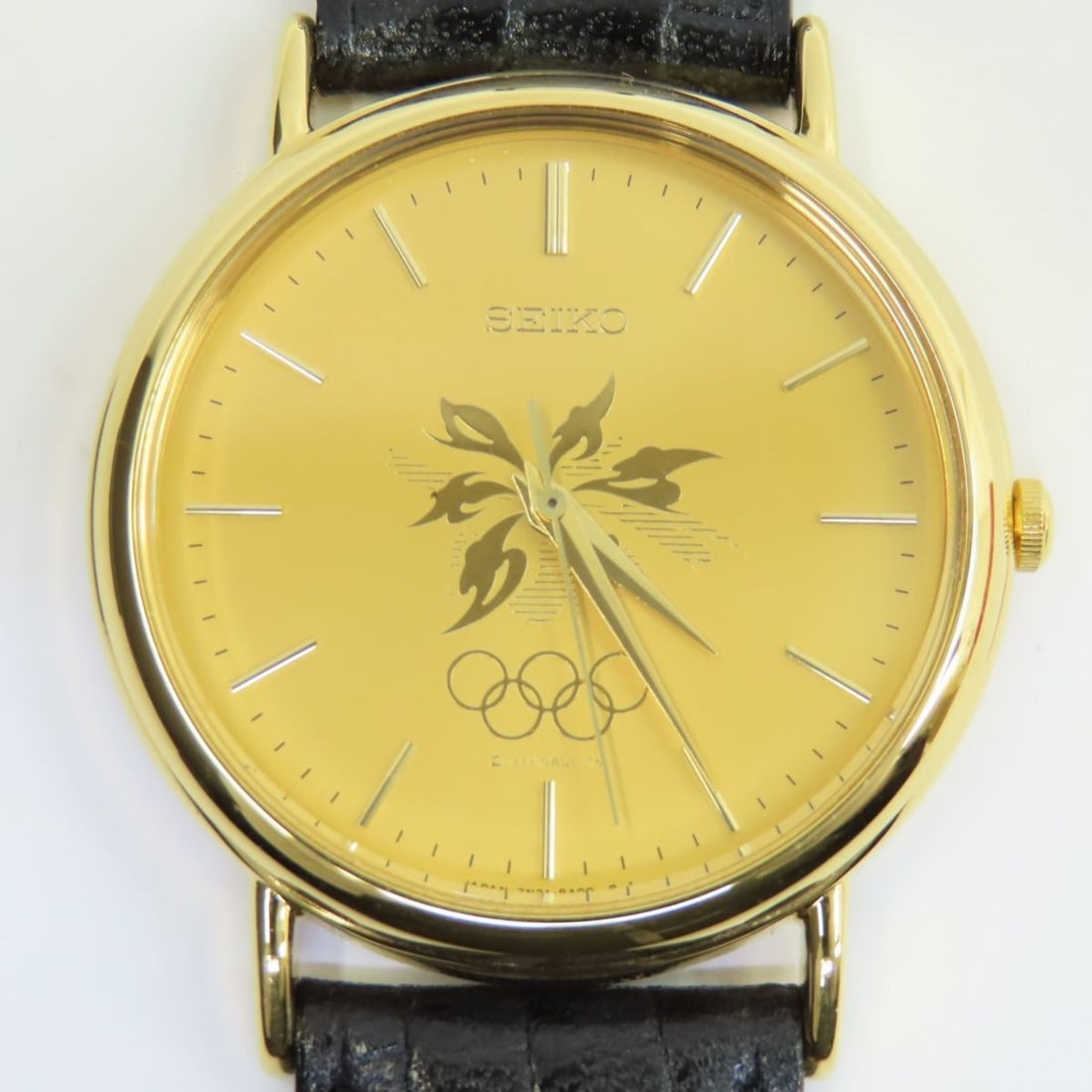 SEIKO Nagano Olympics commemorative model 7N21-8A00 Gold dial quartz wristwatch: --- Catalog ---Category: SizeWrist Size: 15.5cm - 19cm / 6.1'' - 7.48''Category: DesignType: WristwatchGender: MenColor (Dial): GoldCategory: GeneralBrand: SeikoModel: 7n21-8a00Category: MovementMovem