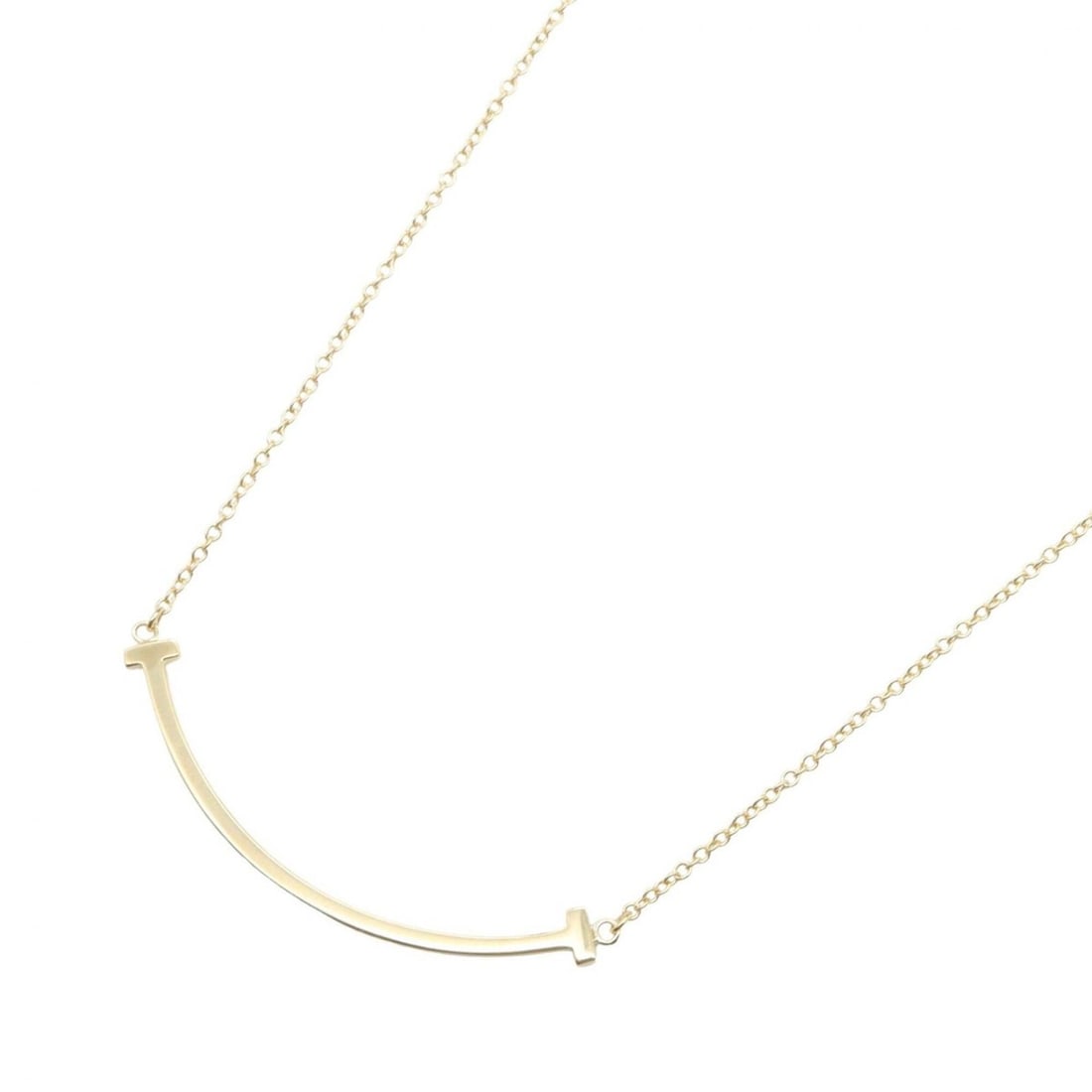 Tiffany & Co. T Smile Small Necklace, 18K (Yellow Gold), Women's Jewelry, Gold Tone: --- Catalog ---Category: SizePendant Size: 6mm x 36mm / 0.23'' x 1.41''Neck Circumference: 41 cm - 46 cm / 16.14'' - 18.11''Category: DesignColor: GoldGender: WomenMaterial: Yellow gold (18K)Necklace 
