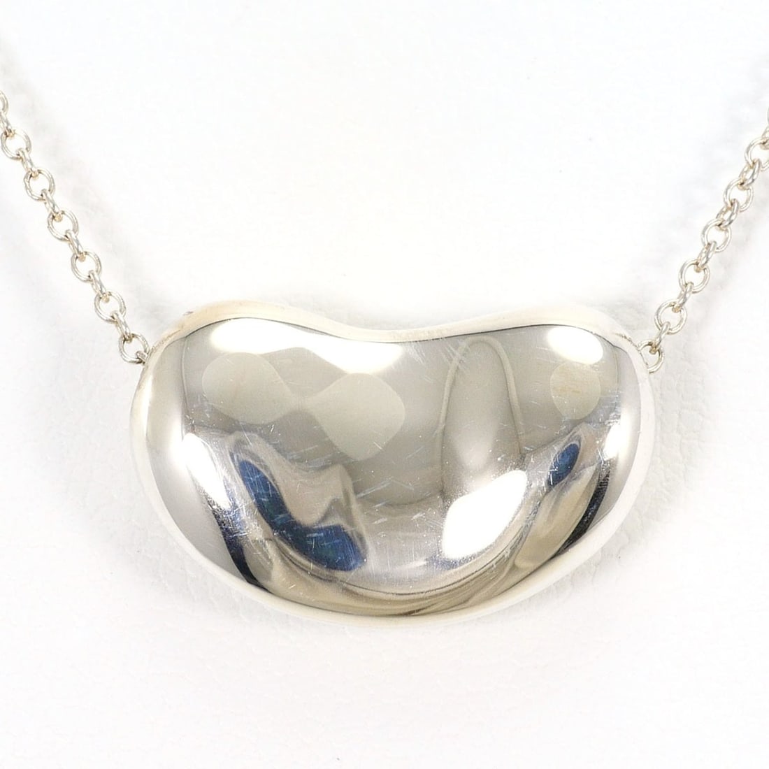 Tiffany & Co. Bean Silver Necklace, Total Weight 8.1g, 43cm, Jewelry: --- Catalog ---Category: SizePendant Size: 11mm x 18mm / 0.43'' x 0.7''Neck Circumference: 43 cm / 16.92''Category: DesignGender: WomenMaterial: Silver 925Necklace Type: NecklaceCategory: GeneralBrand