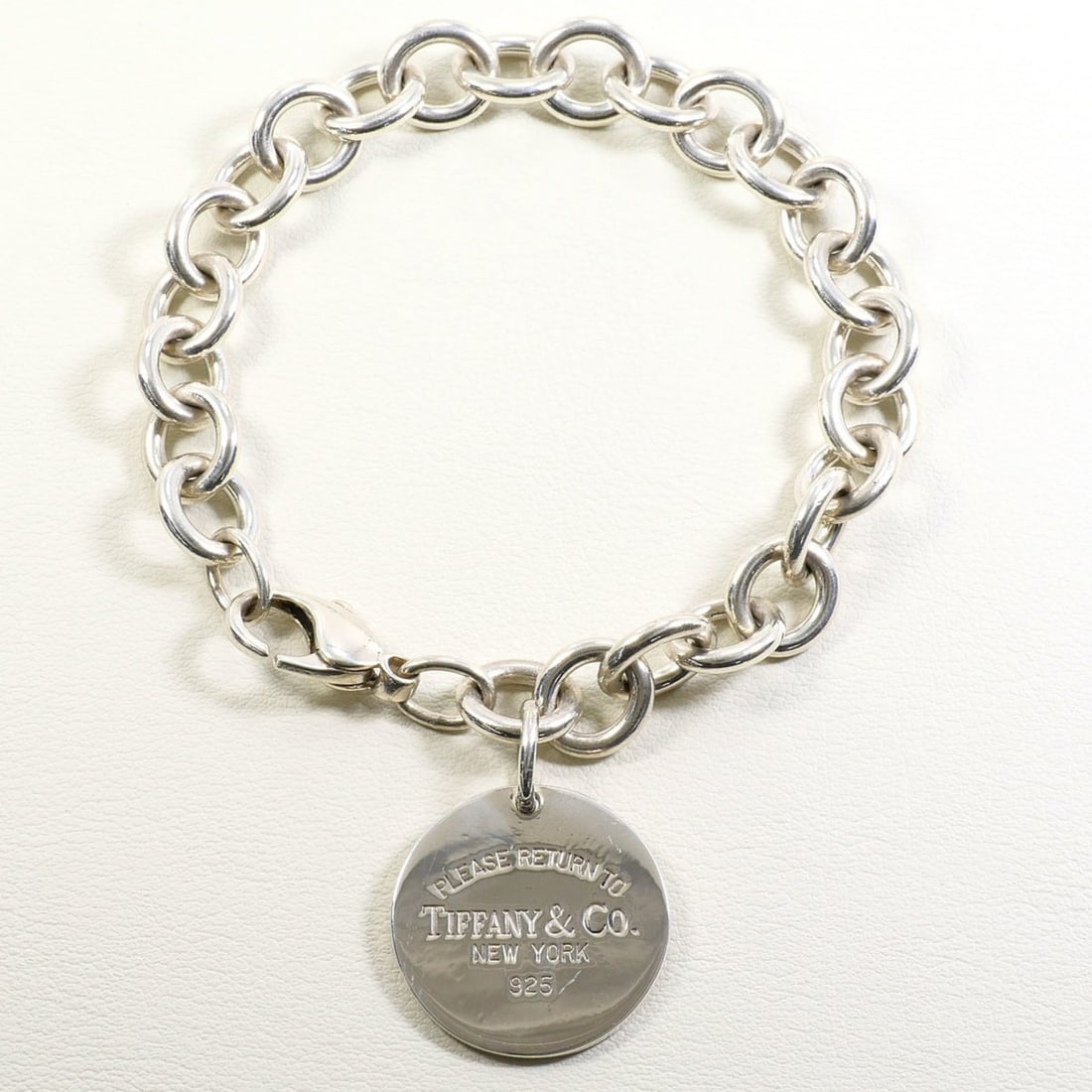 Tiffany & Co. Return to Sterling Silver Bracelet, Approximately 18cm, Total Weight: 34.9g, Jewelry,: --- Catalog ---Category: SizeLength: 18cm / 7.08''Category: DesignType: Charm braceletGender: WomenMaterial: Silver 925Category: GeneralBrand: Tiffany--- Item List ---Section: ConditionRanking: Rank S