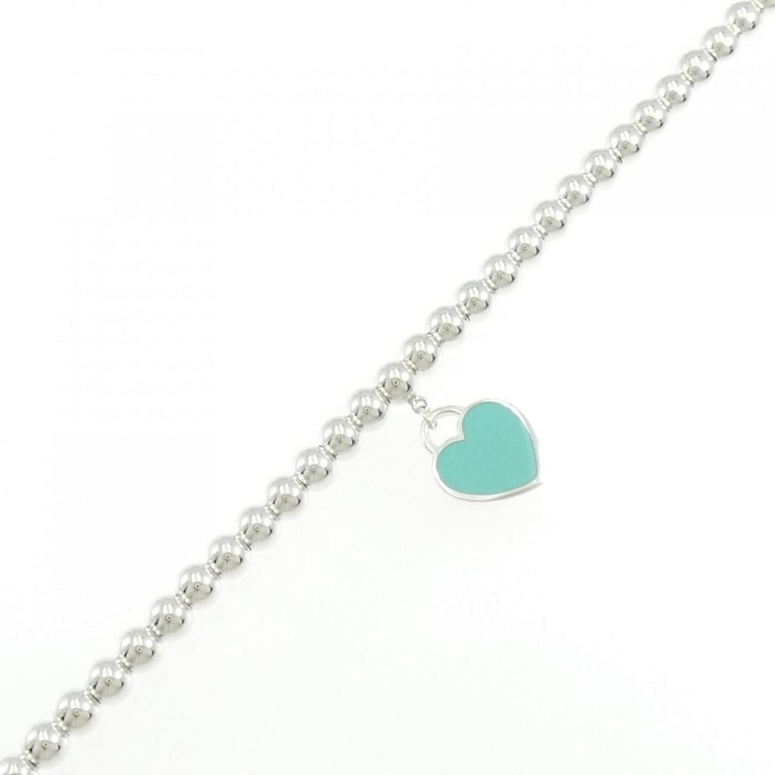 Tiffany & Co. Return to Beaded Bracelet: --- Catalog ---Category: SizeLength: 17.5cm / 6.88''Category: DesignType: Charm braceletColor: SilverGender: WomenMaterial: Silver 925Category: GeneralBrand: Tiffany--- Item List ---Section: