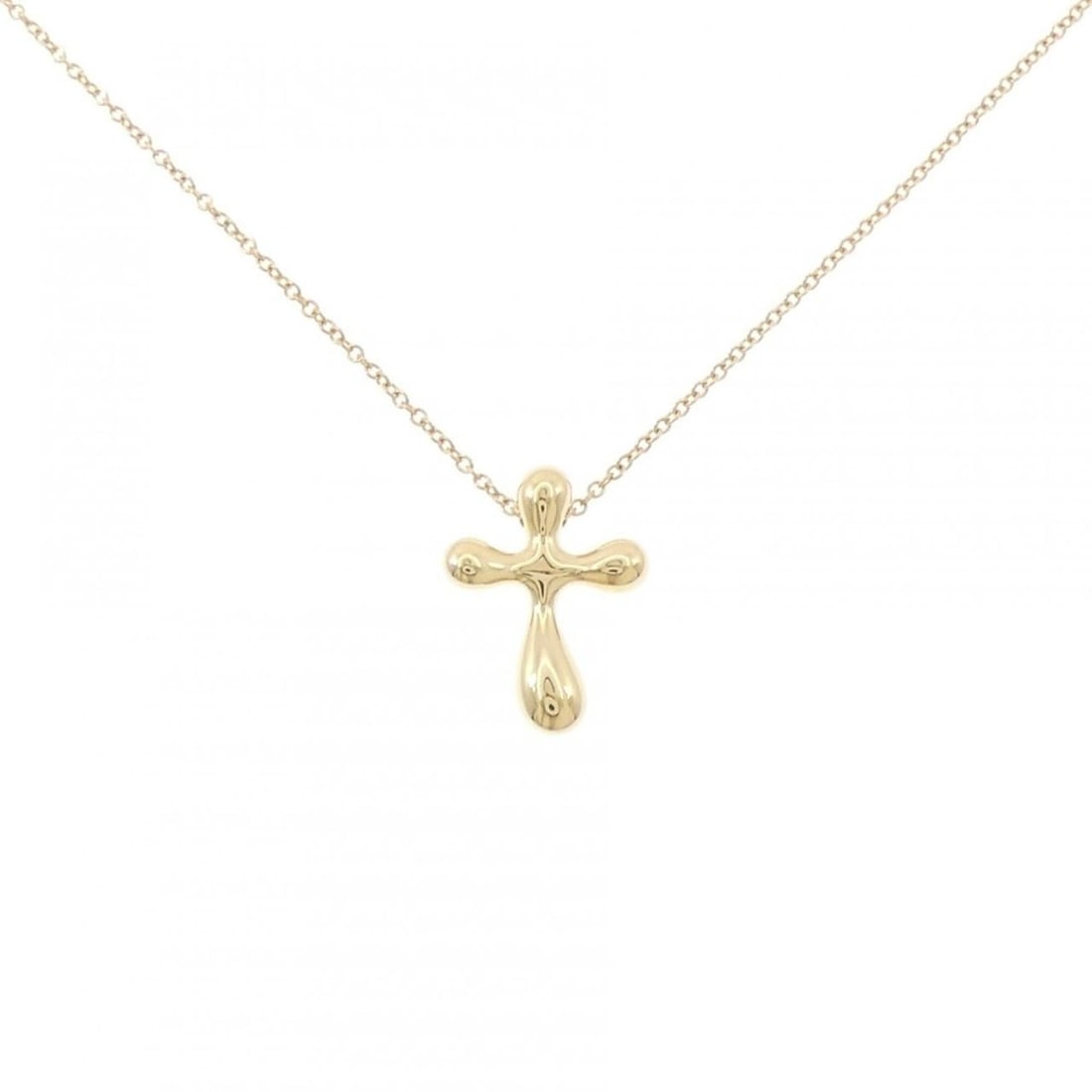 Tiffany Small Cross Necklace: --- Catalog ---Category: SizePendant Size: 15.9mm x 12mm / 0.62'' x 0.47''Neck Circumference: 41 cm / 16.14''Category: DesignColor: Yellow goldGender: WomenMaterial: Yellow gold (18K)Pendant Type: