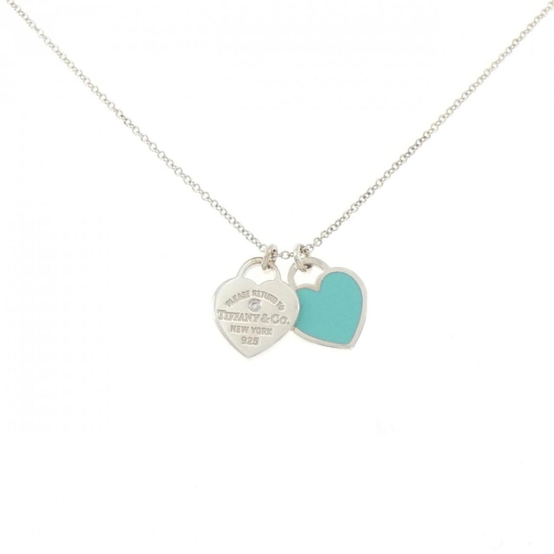 Tiffany & Co. Return to Necklace: --- Catalog ---Category: SizePendant Size: 14mm x 9.9mm / 0.55'' x 0.38''Neck Circumference: 41 cm - 46 cm / 16.14'' - 18.11''Category: DesignColor: SilverStone: DiamondGender: WomenMaterial: Silver