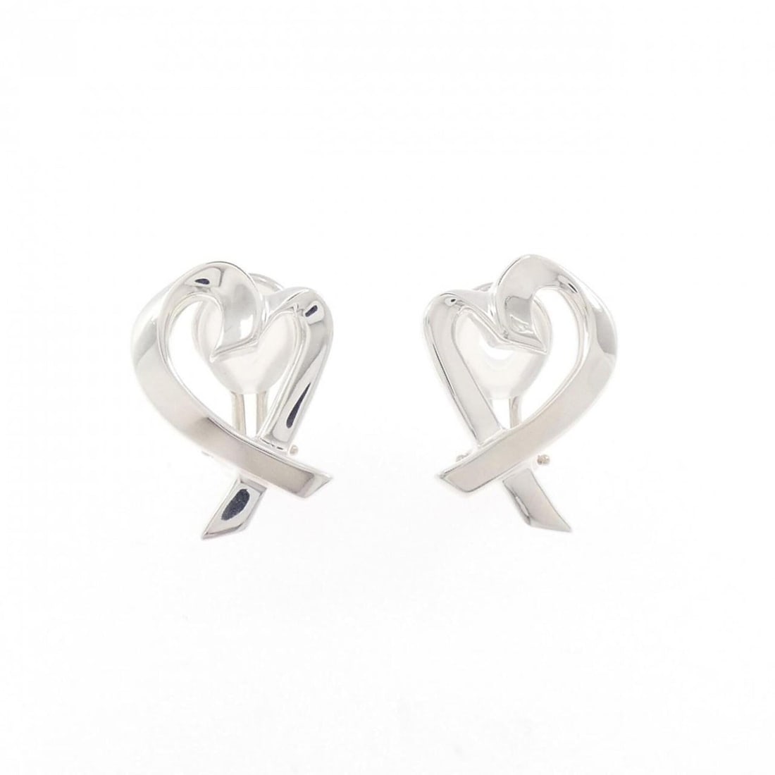 Tiffany Loving Heart Earrings: --- Catalog ---Category: SizeWeight: 7.6g / 0.26oz.Size (HxWxD): 20.50mm x 15.10mm / 0.81'' x 0.59''Category: DesignType: Clip earringsColor: SilverGender: WomenMaterial: Silver 925Category: