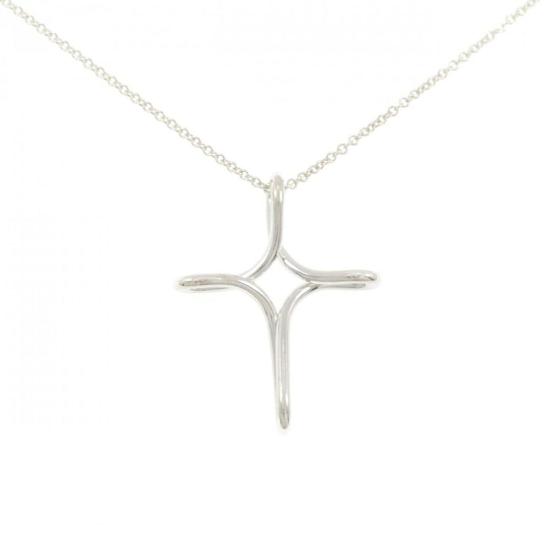 Tiffany & Co. Infinity Cross Necklace: --- Catalog ---Category: SizePendant Size: 36.2mm x 28.5mm / 1.42'' x 1.12''Neck Circumference: 47 cm / 18.5''Category: DesignGender: WomenMaterial: Silver 925Pendant Type: PendantNecklace Type: