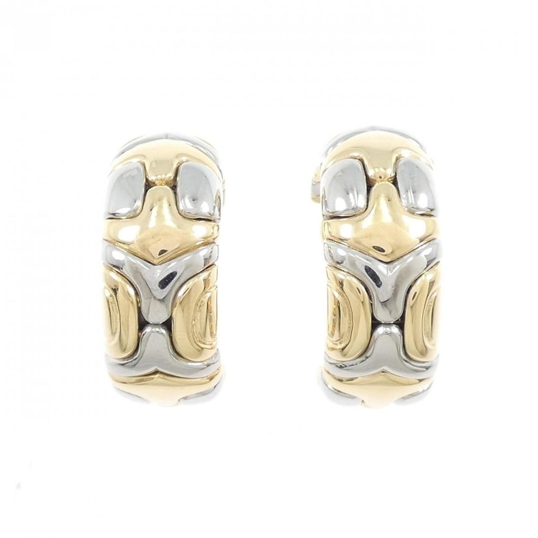 Bvlgari Alveare Earrings: --- Catalog ---Category: SizeSize (HxWxD): 23.60mm x 9.60mm / 0.93'' x 0.38''Category: DesignType: Clip earringsGender: WomenMaterial: Stainless steel, Yellow gold (18K)Category: GeneralBrand: