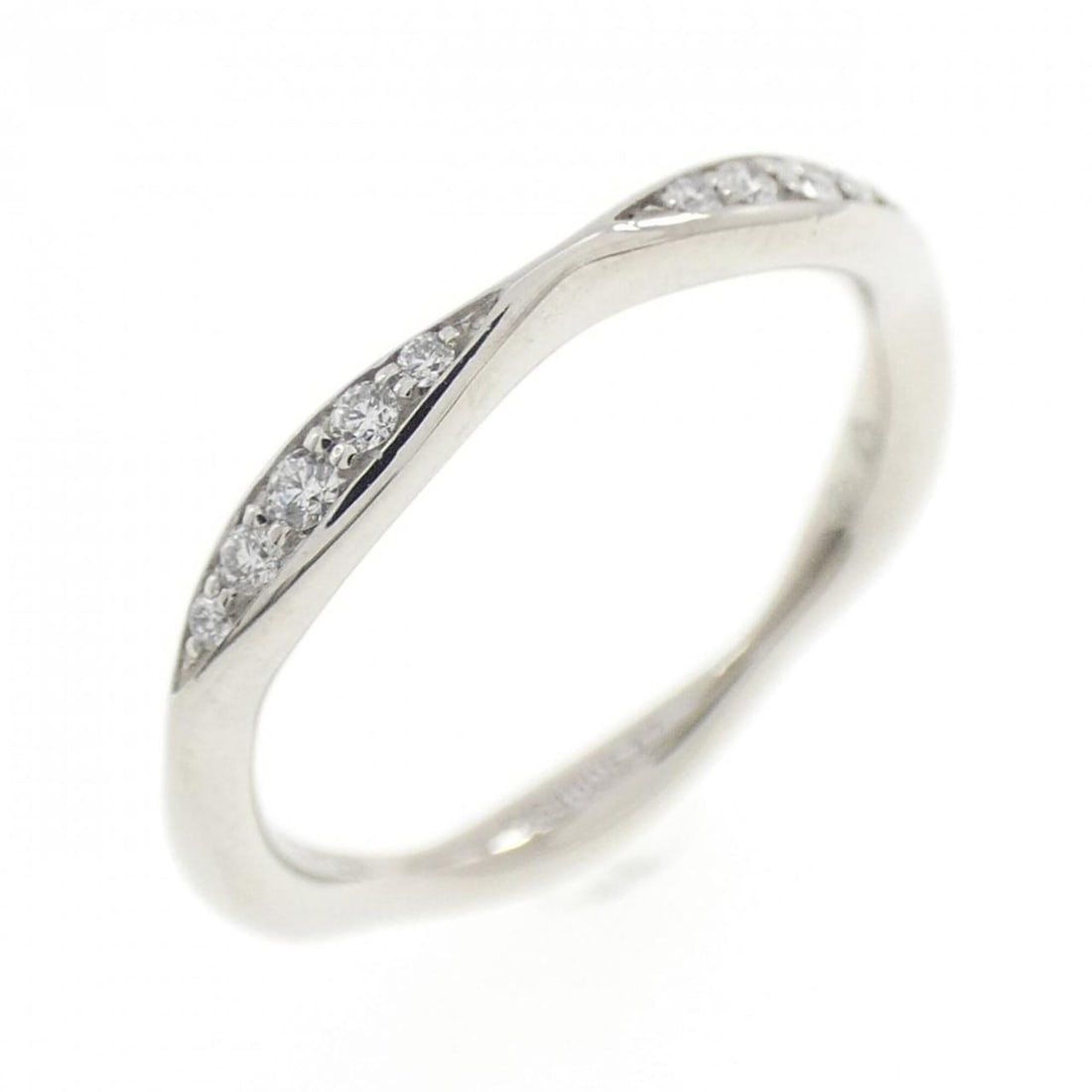 Chanel Camellia Half Eternity Ring: --- Catalog ---Category: SizeUS Size: 4Brand Size: 47Category: DesignType: Band ringColor: PlatinumStone: DiamondGender: WomenMaterial: Platinum 950Category: GeneralMPN: J10835Brand: Chanel--- Item