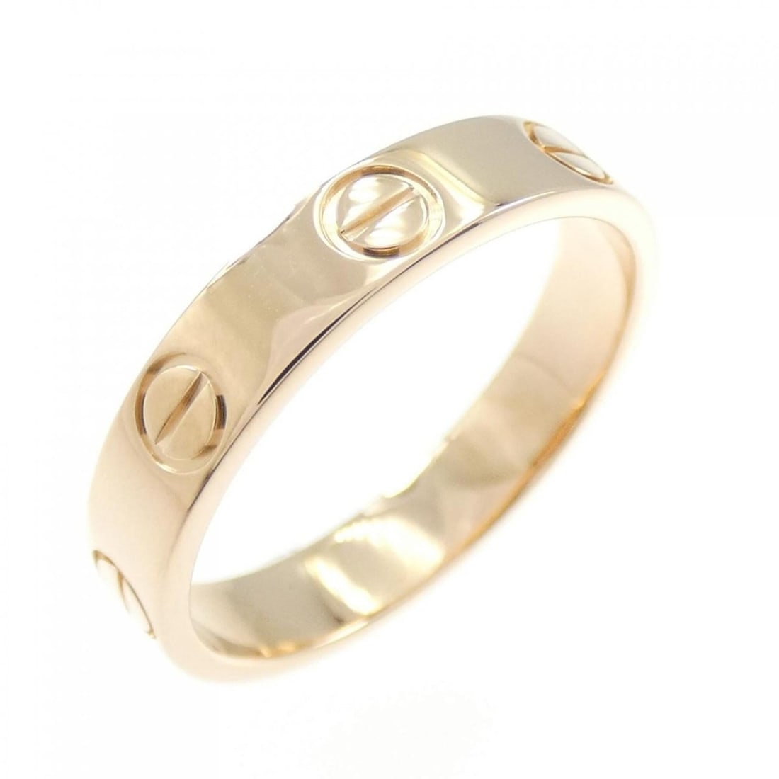 Cartier Mini Love Ring: --- Catalog ---Category: SizeUS Size: 5.5Brand Size: 50Category: DesignType: Band ringColor: Pink goldGender: WomenMaterial: Pink gold (18K)Category: GeneralBrand: Cartier--- Item List ---Section:
