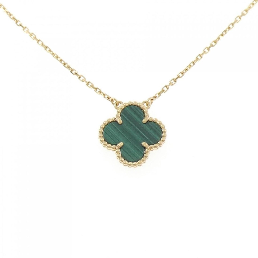 Van Cleef & Arpels Vintage Alhambra Necklace: --- Catalog ---Category: SizePendant Size: 14.8mm x 14.8mm / 0.58'' x 0.58''Neck Circumference: 37 cm - 42 cm / 14.56'' - 16.53''Category: DesignColor: Yellow goldStone: MalachiteGender: WomenMaterial