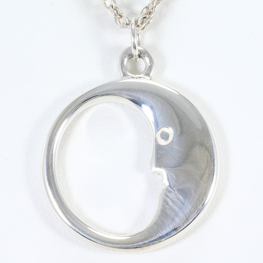 Tiffany & Co. Man in the Moon Silver Necklace, Total Weight 10.2g, 42cm, Like New Condition, Free: --- Catalog ---Category: SizePendant Size: 30mm x 23mm / 1.18'' x 0.9''Neck Circumference: 42 cm / 16.53''Category: DesignColor: SilverGender: WomenMaterial: Silver 925Necklace Type: NecklaceCategory: