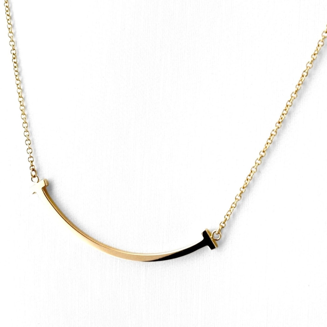 Tiffany & Co. T Smile Necklace, Pink Gold (PG), Pendant 750, Women's: --- Catalog ---Category: SizePendant Size: 10.4mm x 37.3mm / 0.4'' x 1.46''Neck Circumference: 45.5 cm / 17.91''Category: DesignGender: WomenMaterial: Pink gold (18K)Pendant Type: PendantNecklace Type