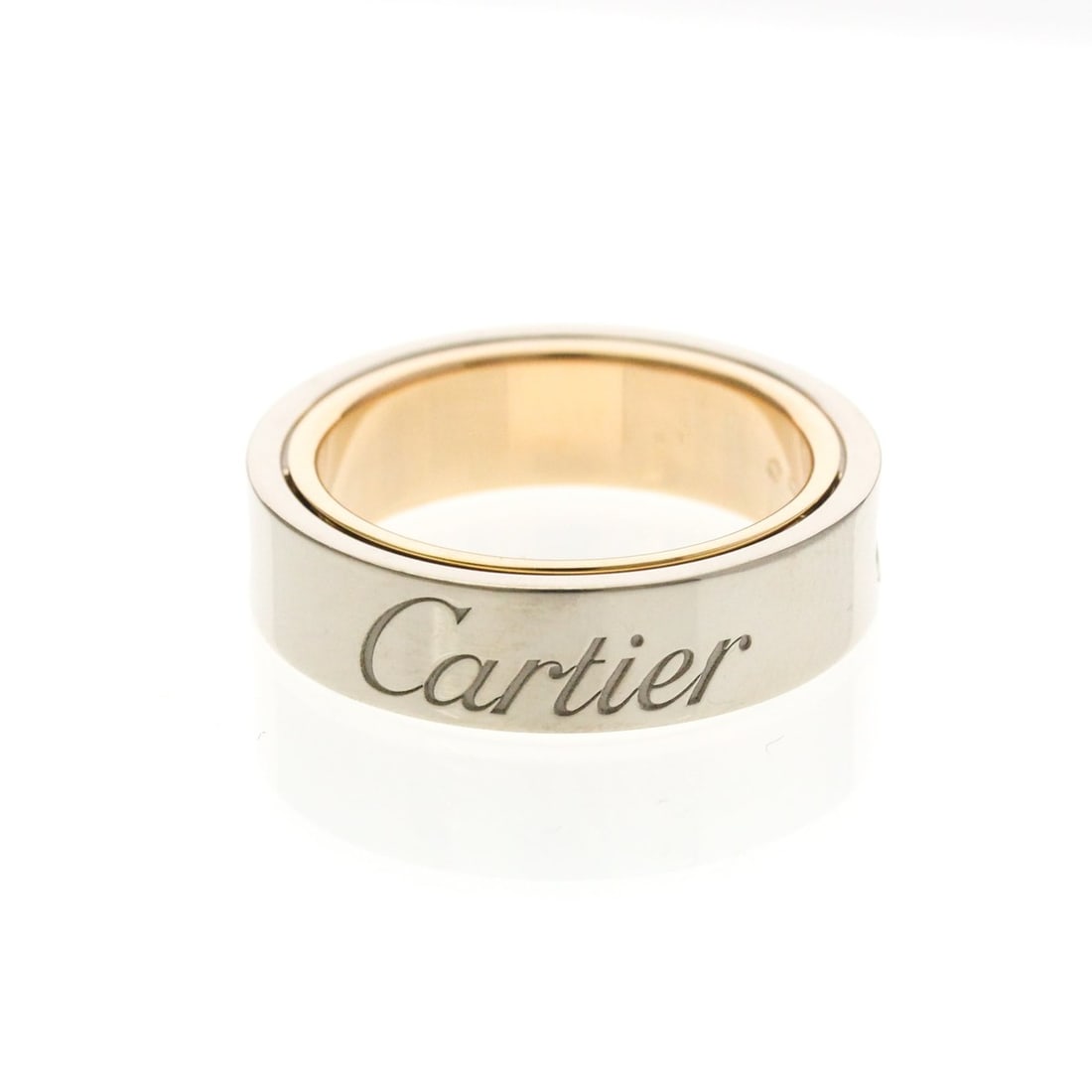 Cartier Secret Love Ring Pink Gold (18K),White Gold (18K) Fashion No Stone Band Ring Silver: --- Catalog ---Category: SizeWidth: 5.5mm / 0.22''Weight: 10.9g / 0.38oz.JP Size: 12US Size: 6Brand Size: 52Category: DesignType: Band ringColor: SilverMetal: Gold, White GoldStone: No StoneStyle: Fas