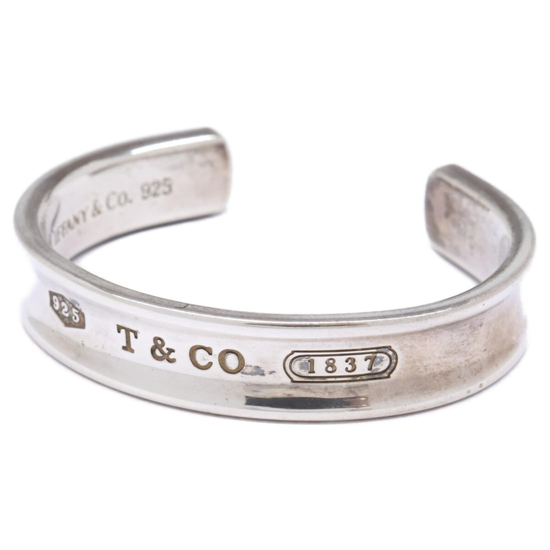 TIFFANY&Co. Tiffany & Co. 1837 925 Bangle Silver Women's: --- Catalog ---Category: SizeLength: 15cm / 5.9''Category: DesignType: BangleColor: SilverGender: WomenMaterial: Silver 925Category: GeneralBrand: Tiffany--- Item List ---Section: ConditionRanking: Ra