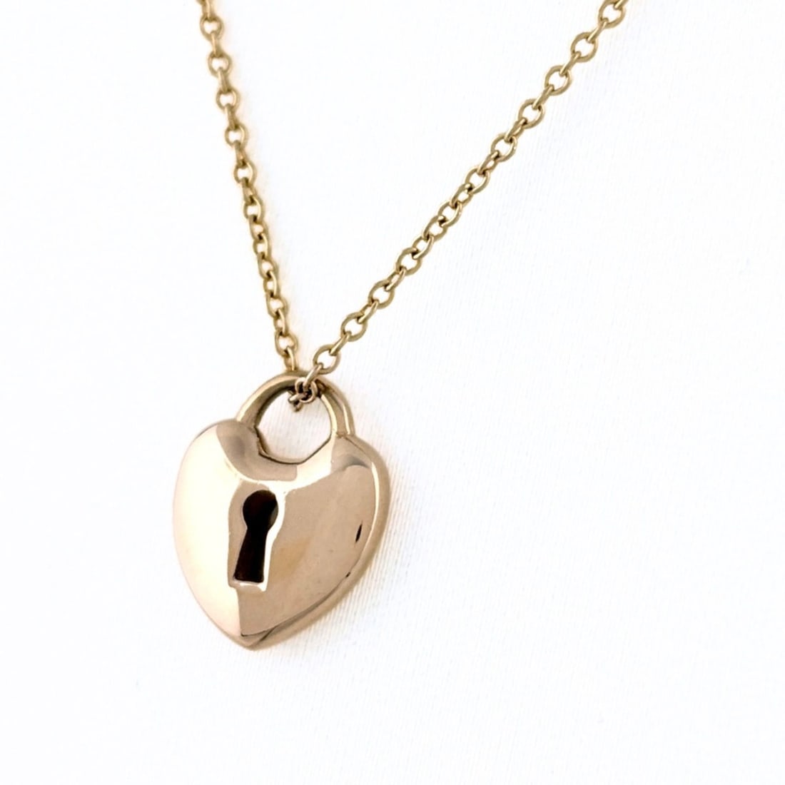 Tiffany & Co. Heart Lock Necklace, Pink Gold (PG), Pendant Key 750, Women's.: --- Catalog ---Category: SizePendant Size: 9.1mm x 11.1mm / 0.35'' x 0.43''Neck Circumference: 40.5 cm / 15.94''Category: DesignGender: WomenMaterial: Pink gold (18K)Pendant Type: PendantNecklace Type