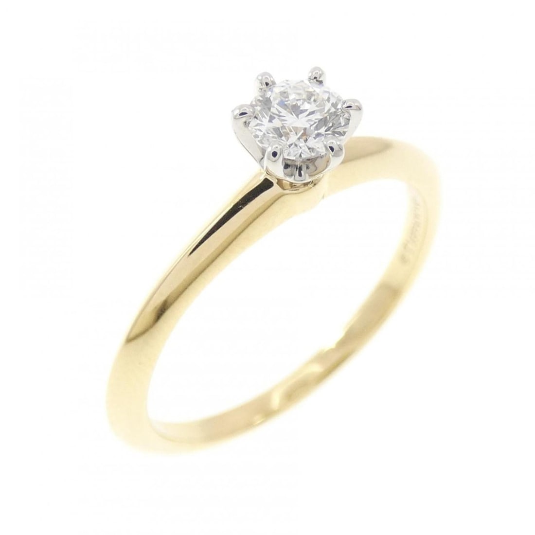 Tiffany Classic Solitaire Ring 0.24 CT: --- Catalog ---Category: SizeJP Size: 11.5US Size: 6Category: DesignType: Band ringStone: DiamondGender: WomenMaterial: Platinum 950, Yellow gold (18K)Category: GeneralBrand: Tiffany--- Item List ---S