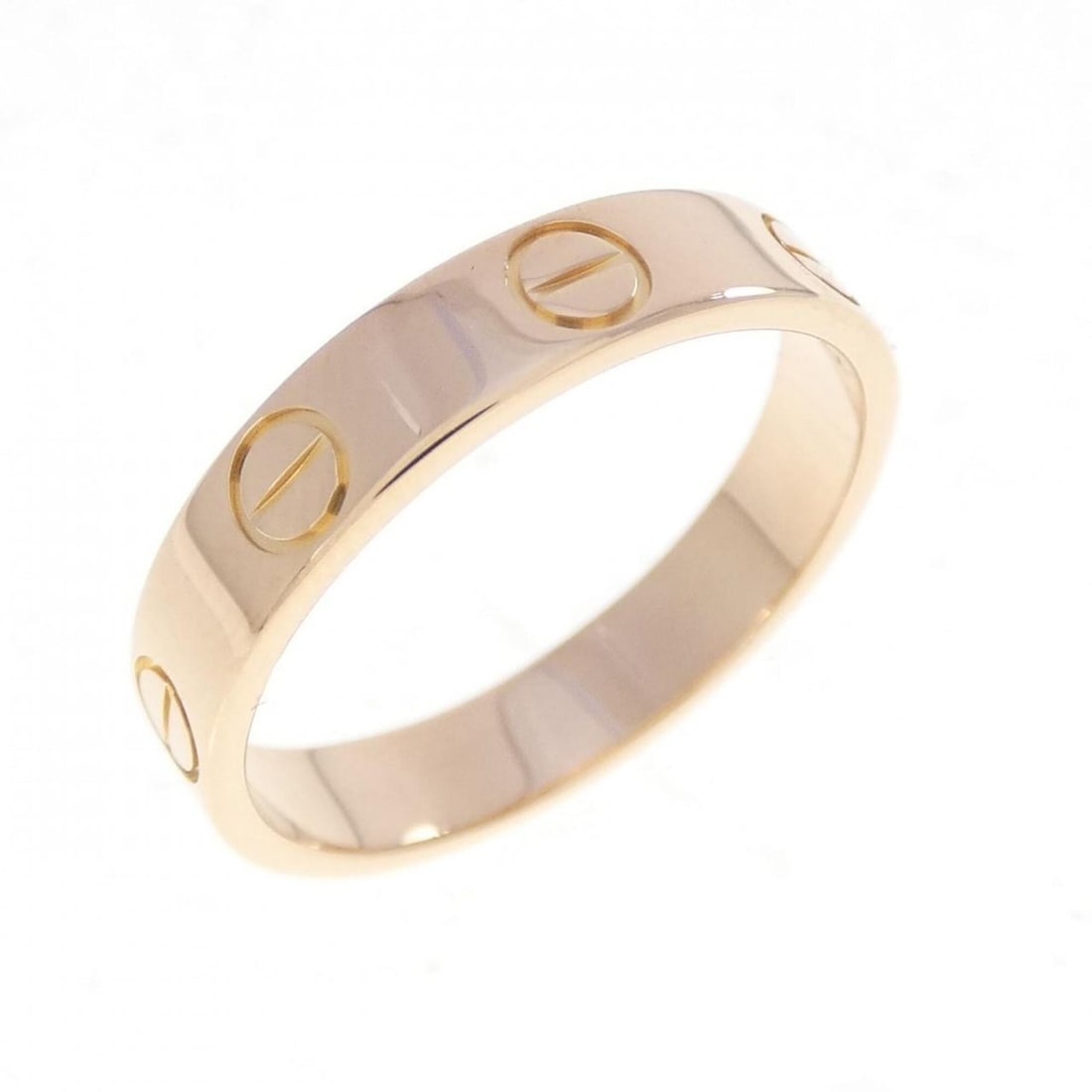 Cartier Mini Love Ring: --- Catalog ---Category: SizeUS Size: 5.5Brand Size: 50Category: DesignType: Band ringColor: Pink goldGender: WomenMaterial: Pink gold (18K)Category: GeneralBrand: Cartier--- Item List ---Section: