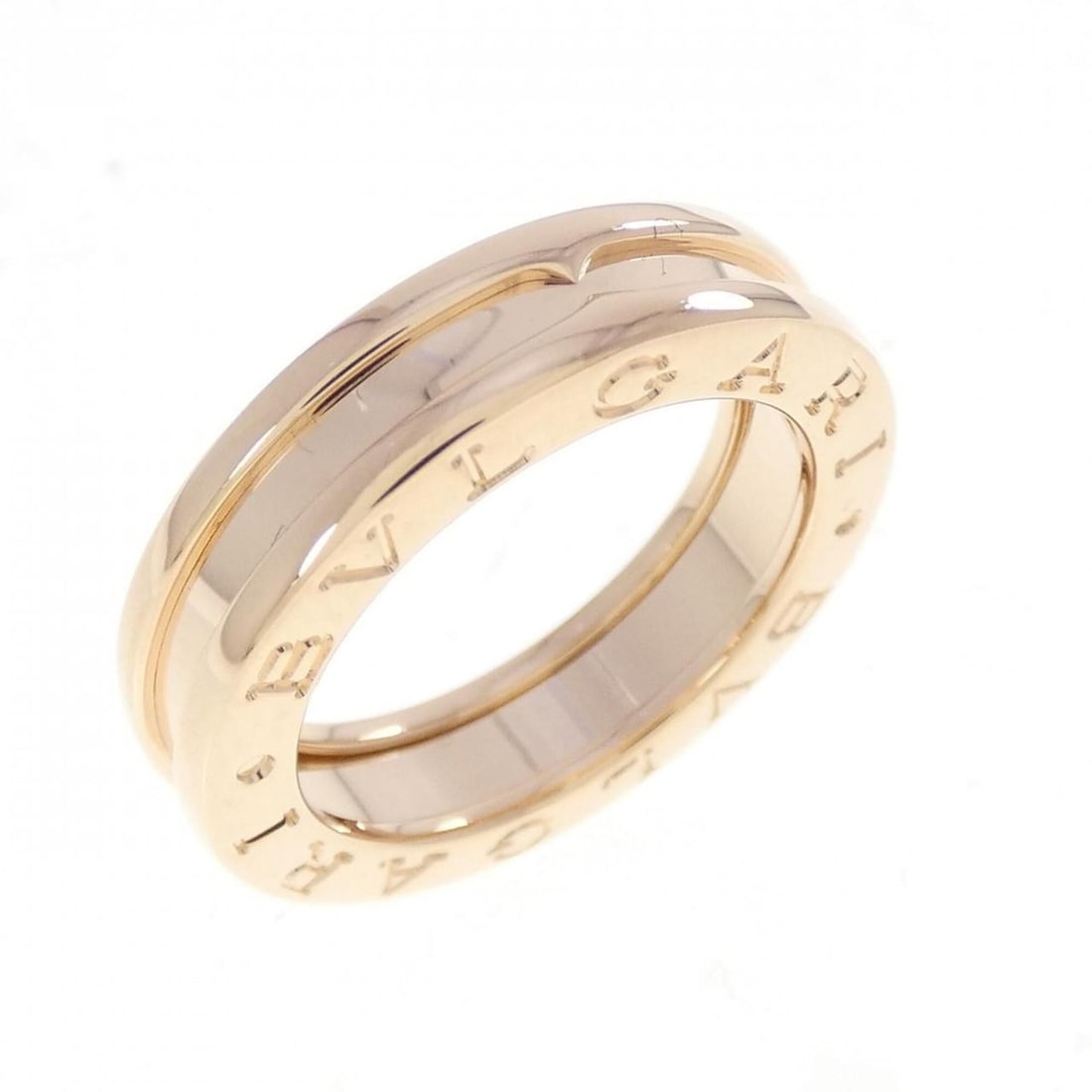Bvlgari B.zero1 1-band ring: --- Catalog ---Category: SizeUS Size: 4Brand Size: 47Category: DesignType: Band ringColor: Pink goldGender: WomenMaterial: Pink gold (18K)Category: GeneralBrand: Bvlgari--- Item List ---Section: Condi