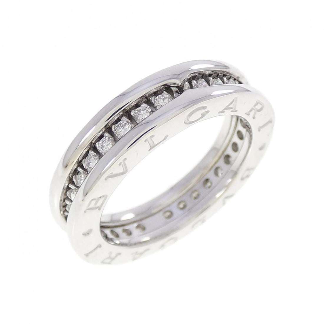 Bvlgari B.zero1 1-band ring: --- Catalog ---Category: SizeUS Size: 5Brand Size: 49Category: DesignType: Band ringStone: DiamondGender: WomenMaterial: White gold (18K)Category: GeneralBrand: Bvlgari--- Item List ---Section: Condit