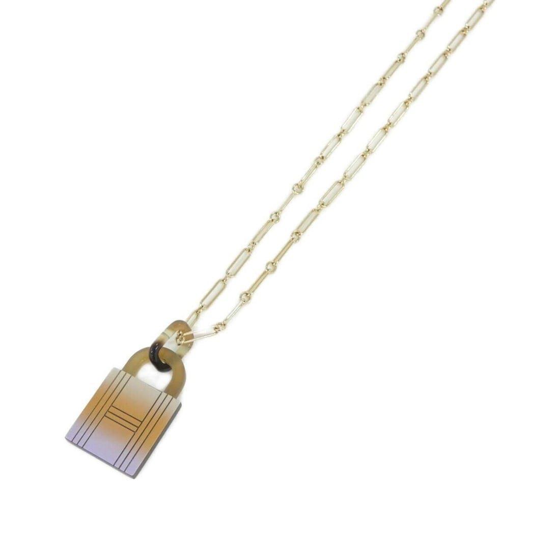 Hermes Padlock Amulet Fusion GM 057120FD Necklace: --- Catalog ---Category: SizePendant Size: 50mm x 25mm / 1.96'' x 0.98''Neck Circumference: 82 cm / 32.28''Category: DesignColor: Gold, LilacGender: WomenMaterial: Buffalo hornNecklace Type:
