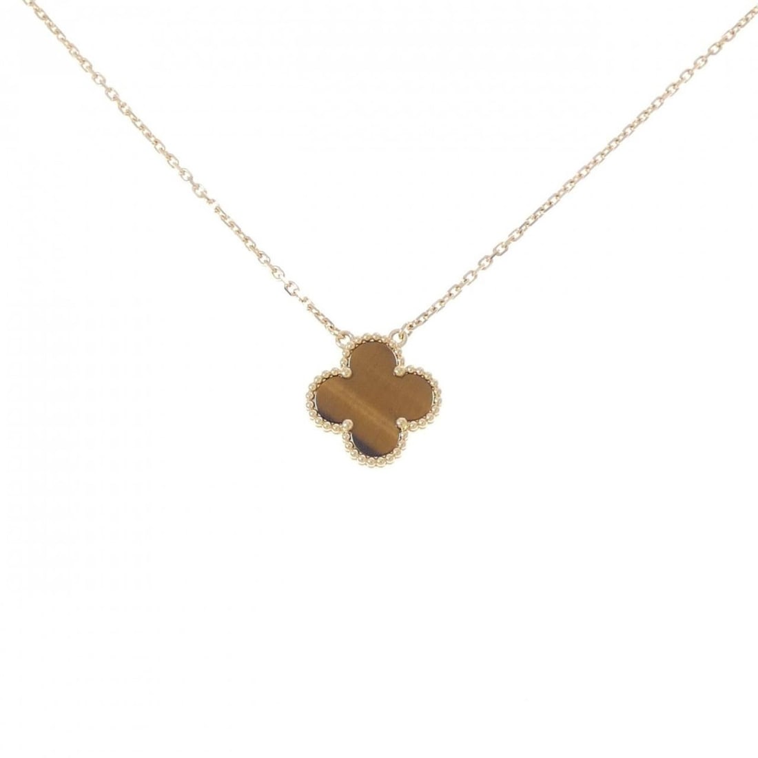 Van Cleef & Arpels Vintage Alhambra Necklace: --- Catalog ---Category: SizePendant Size: 14.8mm x 14.8mm / 0.58'' x 0.58''Neck Circumference: 41 cm - 46 cm / 16.14'' - 18.11''Category: DesignStone: Tiger's eyeGender: WomenMaterial: Yellow gold (1