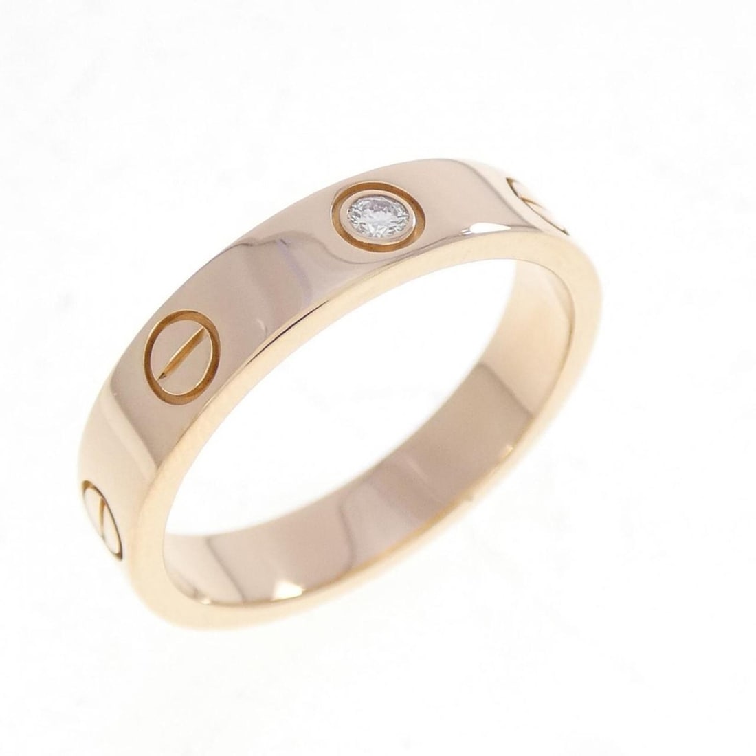 Cartier Mini Love 1P Ring: --- Catalog ---Category: SizeUS Size: 6.5Brand Size: 52Category: DesignType: Band ringStone: DiamondGender: WomenMaterial: Pink gold (18K)Category: GeneralMPN: B4050700Brand: Cartier--- Item List ---S