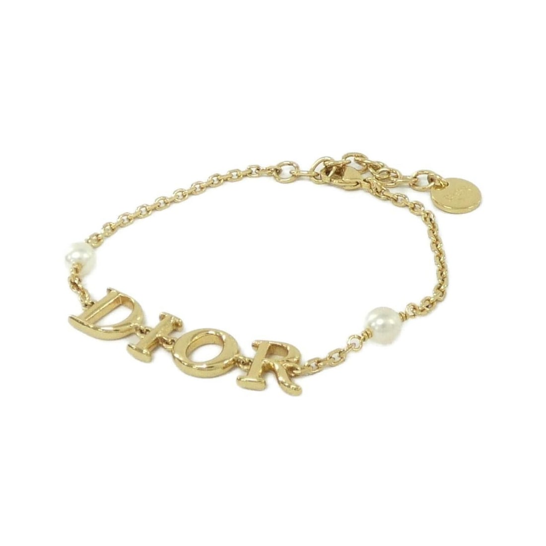 Christian Dior Revolution B1583DVORS Bracelet: --- Catalog ---Category: SizeLength: 16cm - 19cm / 6.29'' - 7.48''Category: DesignType: Charm braceletColor: Gold, WhiteGender: Women,MenCategory: GeneralMPN: B1583DVORSBrand: Christian Dior--- Item L