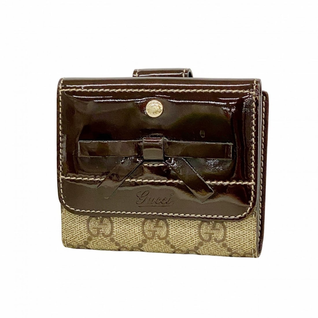 Gucci GG Supreme wallet, model 203557, brown, women's.: --- Catalog ---Category: SizeSize (HxWxD): 9cm x 10.5cm x 2cm / 3.54'' x 4.13'' x 0.78''Category: DesignType: Wallet (bi-fold)Color: BrownGender: WomenMaterial: PVC Category: GeneralMPN: 203557Brand: 