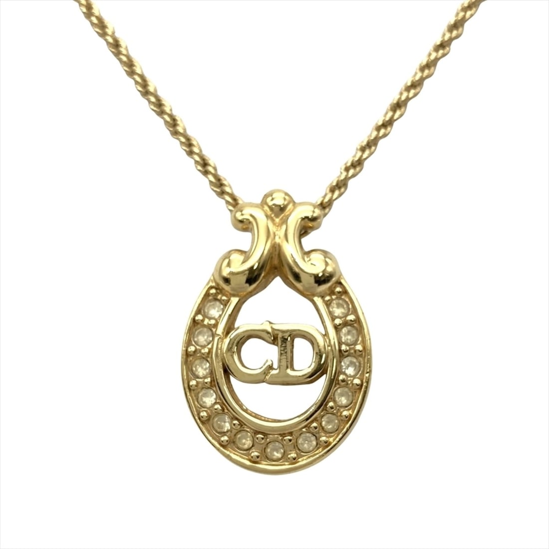 Christian Dior CD Logo Rhinestone Necklace, Metal, Gold, Oval: --- Catalog ---Category: SizePendant Size: 24mm x 15mm / 0.94'' x 0.59''Neck Circumference: 43.8 cm / 17.24''Category: DesignColor: GoldStone: RhinestoneMaterial: MetalNecklace Type: NecklaceCategory: