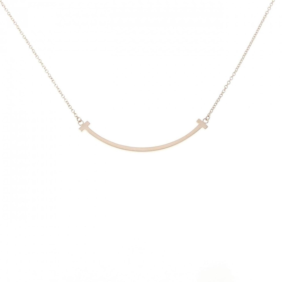 Tiffany T Smile Small Necklace: --- Catalog ---Category: SizeWidth: 0.9mm / 0.04''Weight: 2.7g / 0.09oz.Pendant Size: 3.6mm x 37.3mm / 0.14'' x 1.46''Neck Circumference: 40 cm - 46 cm / 15.74'' - 18.11''Category: DesignGender: